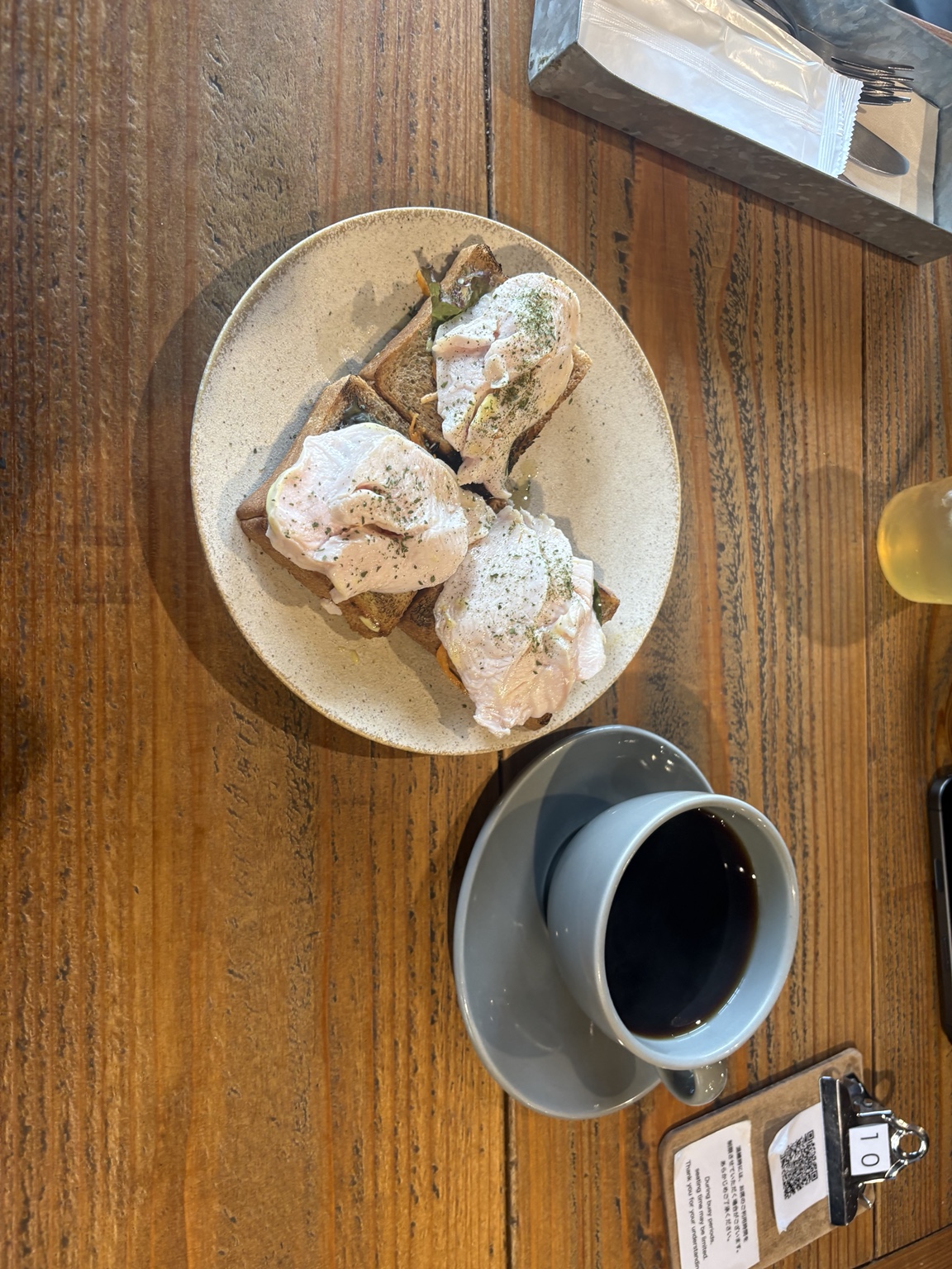 Coffee and breakfast on a wooden table